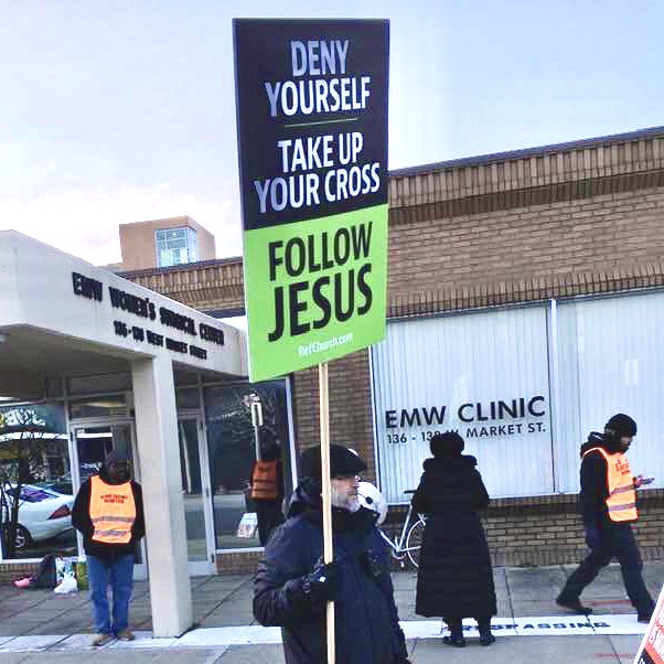 Sign evangelism outside an abortion facility